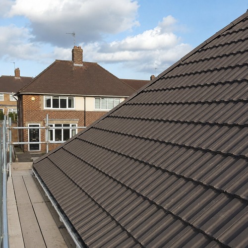 tiled-residential-roof-with-scaffolding