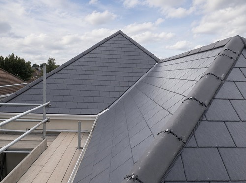 black-residential-roof-with-scaffolding